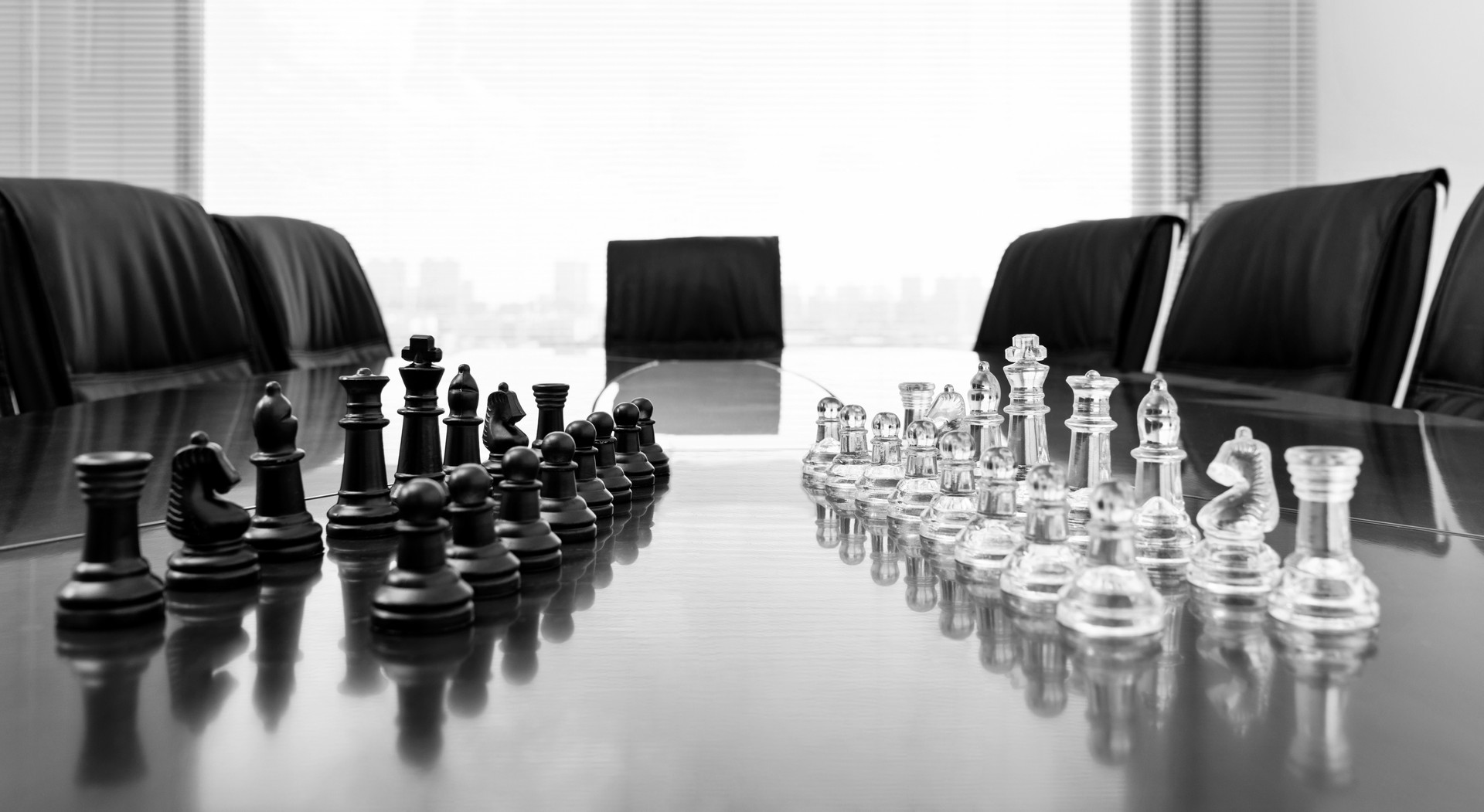 Chess pieces and board on office table
